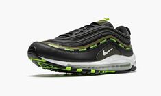 The Undefeated x Nike Air Max 97 “Black/Volt” is one of two Holiday 2020 colorway of the late-90s performance runner produced in collaboration between the Los Angeles based retailer and Nike.  The “Black/Volt” is yet another strong addition to Undefeated’s storied catalog of hype-inducing Air Max 97 colorways.  Following looks such as the “Olive” and “Black” designs from 2017, the “Black/Volt” is a desirable shoe for fans of streetwear and Air Max shoes.  Its look consists of reflective black wa Nike Air Max 97 Black, Black Designs, Air Max Shoes, Late 90s, Stadium Goods, Nike Air Max 97, Black Mesh, Black Design, Air Max Sneakers