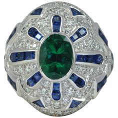 Emerald 1.59 carats, Blue Sapphire 2.14 carats with Diamond 0.88 carat Ring in 18 karat White Gold Settings Width: 2.5 cm Length: 2.3 cm Ring Size: 53 Total Weight: 9.35 grams "We first opened doors in 1980 when it was then situated in the vicinity of the Victory Monument; a small and modest storefront with a couple of counters. From its humble beginnings to where it stands today, our company has proven its abilities as a jeweler. Since the beginning, we have been supplying fine quality pieces t Luxury Diamond White Sapphire Ring In Fine Jewelry Style, Stunning Aesthetic, Blue Sapphire Diamond Ring, Emerald Blue, Blue Sapphire Diamond, Diamond Ring Settings, Pretty Rings, Coat Women, Three Stone Rings