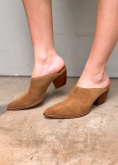 Hop on the TREND TRAIN with these super cute Pointed Toe Suede Mules. The color is chef's kiss for fall. Comfortable enough for all day wear, these new mules from Matisse will become your go to this season. The heel is not too high and the style is perfect. If you live in the south, this will be a good shoe for most of the winter. Suede upper Manmade outsole 2.5 in/6.35 cm heel Textile lining Padded insole Leather stacked heel Imported Trendy Spring Closed Toe Mules, Chic Clogs With 4-inch Block Heel, Fall Block Heels With Contrasting Heel Counter, Workwear Mules With 4-inch Block Heel, Fall Stacked Heel Closed Toe Heels, Chic Spring Clogs With 4-inch Heel, Brown Pointed Toe Mules With 4-inch Heel, Casual Closed Toe Mules With Sculpted Heel, Trendy Mules With Sculpted Heel For Work