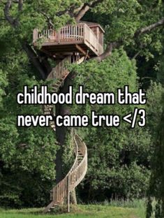 a tree house with stairs leading up to it and the words childhood dream that never came true