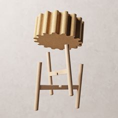 a wooden chair that is shaped like a ladder