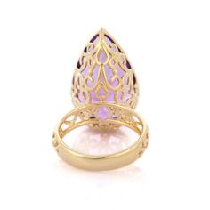 Amethyst Cocktail Ring in 14K Gold is a perfect statement jewelry to match with every outfit of your wardrobe. It's just a simple ring and simplicity is the ultimate form of sophistication.  Amethyst encourages self-control and strengthens the bond in a relationship  PRODUCT DETAILS :-  > Material - 14K Solid Yellow Gold > Gemstone - Amethyst  > Gemstone Weight - 18.2 ct > Gemstone pcs - 1 > Gemstone shape - Pear  > Gemstone size - 25 x 15 mm > Gross Weight - 9.428 Grm > Shank width - 4.05 mm > Elegant Yellow Gold Amethyst Open Ring, Luxury Solitaire Amethyst Ring, Fine Jewelry Open Amethyst Ring For Formal Occasions, Luxury Amethyst Ring For Wedding With Polished Finish, Luxury Polished Amethyst Ring For Wedding, Modern Yellow Gold Amethyst Ring For Wedding, Modern Yellow Gold Amethyst Wedding Ring, Elegant Teardrop Amethyst Ring, Elegant 14k Gold Amethyst Open Ring