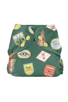 a green cloth diaper with badges on it