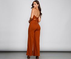 Keep your look sleek and stylish with a jumpsuit that stuns from day to night! The jumpsuit features a sleeveless square neckline. spaghetti straps. an open back with a chic tie-back accent. and a straight-leg fit. The jumpsuit is composed of a crepe fabric that offers a form-hugging fit with a moderate stretch. Complete look with mules.Fit & Features Sleeveless square neckline Spaghetti straps Open back. tie-back accent Straight leg fit Crepe fabric Form-hugging fit. moderate stretch Runs true Wedding Coat, Crepe Jumpsuit, Maxi Dress Pattern, Ribbed Mini Dress, Day To Night, Maxi Knit Dress, Silver Dress, To Night, Crepe Fabric