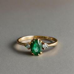 Real Oval Emerald Ring - 14k Gold Dual Prong Zambian Emerald Ring - Grandmother Gift Ring For Women, Yellow Gold Emerald Ring Gift For Women GEMSTONE DETAILS : ✦ Gemstone : Natural Zambia Emerald ✦ Gemstone Size : 6 x 4 mm ✦ Gemstone Shape : Oval Cut ✦ Number of Gemstones : 1 ✦ Gemstone Weight : 1.50 Carat ✦ Gemstone Grade : Vivid DIAMOND  DETAILS : ✦ Diamond Type : Natural ✦ Diamond Size : 4x2 MM ✦ Diamond Color : G-H ✦ Diamond Clarity : Slightly included ✦ Diamond Cut : Pear ✦ Diamond Weight : Real Emerald Necklace, Mens Emerald Rings, Smaragd Ring, Rainbow Sapphires, Emerald Ring Gold, Zambian Emerald, Grandmother Gifts, Emerald Pendant, Pear Diamond