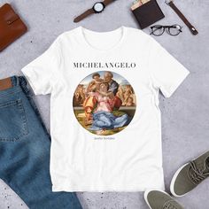 About the Shirt Design: - This shirt feature artwork by artists Michelangelo - The back of the shirt is blank - Shirt comes in white and black About the Shirt Fabrication: - Super soft 100% cotton - Excellent quality print - Retail fit - Light fabric (4.2 oz/yd² (142 g/m - Tear away label - Runs true to size Artsy Short Sleeve T-shirt With Artwork, Artsy White T-shirt With Artwork, Custom Artwork Short Sleeve T-shirt For Gift, White Custom Print Artistic Art, Short Sleeve T-shirt With Custom Artwork As Gift, White Artistic Art With Custom Print, Artistic White Art With Custom Print, Custom Artwork On Cotton For Art Collection, Artistic Graphic Print Art Gift