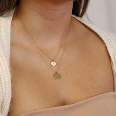 Delicate gold initial disc necklace. Personalized hand stamped gold filled or silver circle necklace. Perfect everyday necklace and great for layering with longer chains or a sweet gift for moms, sisters or friends. *** 14k gold filled, rose gold filled or sterling silver disc. *** Initials stamped by hand. *** Satin finish, hammered or hammered edge. ***Chain is 16"to18"adjustable Disc measurement : 1/2" inches (13mm) diameter. You can choose material ( sterling silver , yellow gold filled or r Initial Disc Necklace, Dainty Initial Necklace, Gold Disc Necklace, Gold Circle Necklace, Gold Coin Necklace, Topaz Jewelry, Initial Necklace Gold, Gold Disc, Tourmaline Jewelry