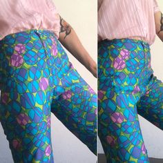 "Vintage high waist pants Made in France 1970s Abstract pattern pants in blue,green and pink colors. Trapered pants with crease . Front zipper and hook. Slightly shiny fabric. High waist. In good condition. To note: Retouch on bottom of the right leg present (photo). Price takes into account it flaws. Estimated size : FR38 US6 UK8 Our model wears usually a size S (UE36/38) and is 170cm/66,9\" tall. Measurements (flat): Waist: 33cm - 12,9\" Hips: 50cm - 19,6\" Front crotch: 27cm - 10,6\" Back cro Pattern Pants, Shiny Fabric, High Waist Pants, Tapered Pants, Pants Pattern, Waist Pants, High Waisted Pants, Abstract Pattern, Front Zipper