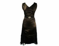 Authentic 1920s flapper dress with Art Deco details! This chocolate silk satin cocktail has a V-neck with subtle ruching at the piped shoulders, a sheath silhouette, and lace panniers that create a terraced hem. The beautiful geometric buckle is antique metal scrollwork with prong-set rhinestones on a self satin band. Skirt has angular piping that echos the Deco geometry. Gorgeous! Ladies' Size 8 to 9 Measurements Bust 35.5, Waist up to 34, Hip 38; Shoulder to Waist 16, Shoulder to Hem 42 Inches Gatsby Style Party, 1920s Flapper Dress, Cocktail Art, Gatsby Style, 1920s Flapper, 1920s Dress, Antique Clothing, Style Party, Brown Silk