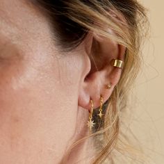 Gold huggie hoop earrings with a small Pavé Star Flare accent that hug your ear perfectly. Perfect to create your celestial ear stack Gold Vermeil Pavé Cubic Zirconia crystal Hypoallergenic, lead & nickel free Inside Diameters: 0.27in(6mm), 0.3in(7.5mm) Star Flare Accent: 0.18in(4.5mm) Click close mechanism #E585-G Gold Huggie Hoop Earrings, Huggie Earrings Gold, Ear Stack, Tiny Studs, Tiny Stud Earrings, Tiny Diamond, Silver Shop, Huggie Earrings, Huggie Hoop Earrings