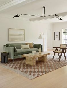 the living room is clean and ready to be used as an office or family room