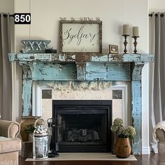 a living room filled with furniture and a fire place in front of a painting on the wall