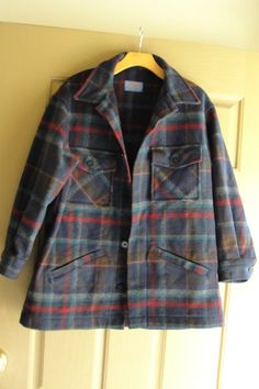 Pendleton plaid short sleeve button up jacket. Thick wool material!! Labeled as a size M. please check sleeve length.   No  holes!!   In good vintage condition!Measurements taken across front lying flat22" armpit to armpit30" length20.5" across shoulders20" sleevelength Wool Button-up Shacket For Winter, Flannel Outerwear With Buttons, Winter Wool Button-up Shacket, Long Sleeve Flannel Outerwear With Buttons, Winter Plaid Shacket With Buttons, Wool Shacket With Button Closure For Fall, Fall Wool Shacket With Button Closure, Winter Wool Shacket With Button Closure, Winter Plaid Collared Shacket