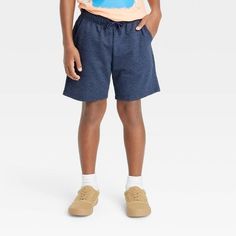 Your child will be ready for warm-weather days in these Pull-On Knit Shorts from Cat & Jack™. Crafted from a soft cotton-blend fabric, these regular-rise shorts offer them cool comfort, and they're designed with a flexible drawstring to help them find a secure fit. Best of all, these above-knee shorts feature two side pockets for added functionality. They can coordinate them with a variety of their tops for versatile casualwear options. 

Cat & Jack™: Classics with an imagination of their own. Playful Cotton Bottoms With Relaxed Fit, Casual Short Bottoms For School, Casual Short Length Bottoms For School, Sporty Cotton Bottoms For School, Casual Cotton Playwear Shorts, Casual Relaxed Fit Shorts For Playwear, Casual Cotton Bottoms For Playwear, Cotton School Bottoms With Elastic Waistband, Playful Bottoms With Elastic Waistband For School