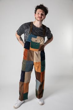 Add a touch of laid-back, vintage style to your wardrobe with our Patchwork Men's Corduroy Overalls. Crafted from durable yet soft corduroy fabric, these overalls feature a unique patchwork design, making each pair a standout piece. Whether you're heading to a festival, working outdoors, or just hanging out, these overalls offer the perfect mix of comfort, functionality, and style.The adjustable shoulder straps allow for a customizable fit, while the roomy pockets provide plenty of space for all Vintage Cotton Patchwork Overalls, Unique Overalls, Overalls Outfit Fall, Unisex Overalls, Styling Overalls, Overalls Men Fashion, Earthy Fashion, Opera Design, Patchwork Outfit