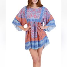 Billowy Kimono Sleeves And An All-Over Mix Of Prints Collide On This Babydoll Dress From Robbie Bee. *Size Medium *New With Tags *Pullover *Round Neck *3/4 Kimono Sleeves *Lined *Imported *Product Specifications *36" L *Material & Care *Rayon *Machine Washable Flowy Printed Mini Dress For The Beach, Flowy Mini Boho Dress With Print, Flowy Mini Length Boho Dress, Casual Blue Floral Print Tunic, Free Size Pink Spring Dresses, Flowy Tunic Mini Dress For Beach Cover-up, Pink Free Size Dress For Spring, Pink Free Size Dresses For Spring, Multicolor Flowy Boho Dress With Short Sleeves