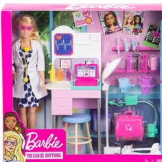 a barbie doll plays in her dressing room