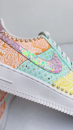 Neha Assar has literally given Nike AF1 sneakers a South Asian bridal makeover! These one-of-a-kind sneakers are hand painted with pale yellow, pastel mint and soft peach with matte white mehndi inspired art. The pattern play on these sneakers is what gives them personality. Moghul motifs are placed adjacent to florals Pastel High-top Custom Sneakers For Streetwear, Pastel Lace-up Custom Sneakers For Streetwear, Pastel Sneakers For Spring Streetwear, White Mehndi, Custom Painted Shoes, Yellow Pastel, Bridal Makeover, Custom Kicks, Mehndi Patterns