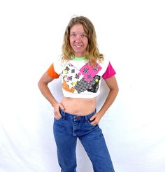 "By Break Out Fun kids size top that fits like a womens XS cropped tee! 50/50 poly cotton Great vintage shape. Lying flat... ~17\" armpit to armpit ~14\" top to bottom" Retro Patchwork T-shirt For Spring, Retro Crew Neck Patchwork Top, Retro Patchwork Crew Neck Top, Retro Fitted Cropped T-shirt With Crew Neck, Retro Fitted Crew Neck Cropped T-shirt, 90s Inspired Short Sleeve Crop Top For Spring, Fitted Retro Cropped T-shirt Crew Neck, Spring 90s Inspired Short Sleeve Crop Top, 90s Style Cropped T-shirt For Spring