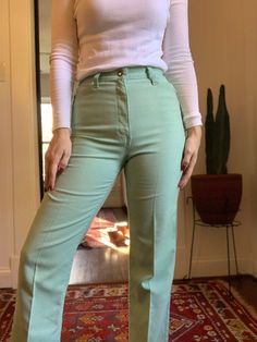 "Vintage mint green Levis pants- linen style fabric. Super comfortable and flattering cut- these seem to be a rare find! Measurements: Wait 26\" Rise 12\" Inseam 28\" Hip 32\" *Please note that the above measurements were taken by me, I do not rely on sizing information provided on garment tags." Green Stretch Wide Leg Jeans, Fitted Green Wide-leg Jeans, Fitted Green Bottoms With Pockets, Fitted Full-length Green Bottoms, Fitted Full Length Green Bottoms, High Waist Fitted Green Bottoms, Green High Waist Fitted Bottoms, Green Fitted High Waist Bottoms, Fitted High Waist Green Bottoms