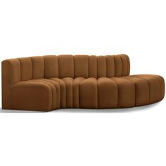 a brown couch sitting on top of a white floor