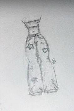 a pencil drawing of a dress on a piece of paper