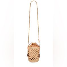 Stylish And Oh So Cute, The Sayulita Bag Is A Natural Canvas And Basket Bag Featuring An Interior Canvas Pouch And Drawcord Accented With Wooden Beads, And Adjustable Strap.. Sold Out Everywhere Natural Canvas/Basket Bag Wooden Beads Interior Canvas Pouch W/ Drawcord 22.5" Strap, 18" Circumference Material: Paper Raffia Crossbody Casual Romantic Bohemian Boho Brown Bamboo Handle Bucket Shoulder Bag, Chic Light Brown Bucket Straw Bag, Chic Open Weave Bucket Shoulder Bag, Vacation Woven Leather Crossbody Bucket Bag, Woven Leather Bucket Shoulder Bag, Chic Brown Bags With Natural Fiber, Chic Natural Color Open Weave Bucket Bag, Chic Brown Natural Fiber Bag, Chic Brown Natural Fiber Bags