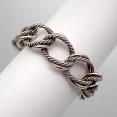 Vintage Italian 800 silver chain bracelet, made of large textured oval links by Uno-A-Erre of Arezzo. This catchy bracelet is 7 1/2" long, 5/8" wide, weighing 48.5 grams or 1.56 ozs Troy. EA5528 Silver Oval Link Chain Bracelet, Silver Chain Bracelet, Vintage Italian, Chain Link Bracelet, Link Bracelets, Chain Bracelet, Chain Link, San Jose, Silver Chain