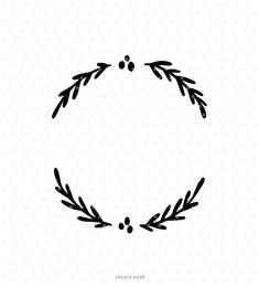 a black and white photo of a circle with leaves on it, in the middle