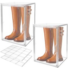 two clear acrylic boxes with brown boots in them, one is open and the other is closed