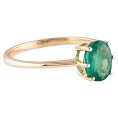 Elevate your style with this stunning 14K Yellow Gold Emerald Cocktail Ring, a timeless piece that exudes sophistication. Crafted with precision, it features a captivating 0.97 carat oval modified brilliant emerald, showcasing a vibrant green hue that mesmerizes the eye. The elegant design boasts a slender band with a width of 1.7mm, perfectly complemented by the ornamental centerpiece measuring 7.8mm in length and 7.6mm in width. Each detail speaks of luxury and refinement, from the meticulously selected emerald to the gleaming 14K gold setting. With a total weight of 2.0 grams, this ring offers both style and comfort for everyday wear or special occasions. Revel in the beauty of this exquisite piece, a true testament to timeless elegance. Specifications: * Metal Type: 14K Yellow Gold * S Emerald Cocktail Ring, Emerald Cocktail, Green Gemstones, Vibrant Green, Timeless Treasures, Cocktail Ring, Cocktail Rings, Timeless Pieces, Vintage Gold