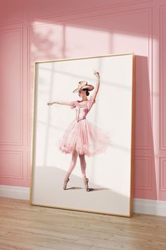 a woman in a pink dress and hat with her arms up, standing next to a wall