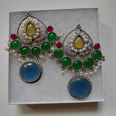 Colorful Large Silver Tone Earrings With Glass And Acrylic Stones And Faux Pearl Dangles Blue, Green, Red And Yellow Approx 2.5" Excellent Condition/Nwot Also Available In Light Green And Pink See My Other Listings Offers And Questions Are Always Welcome Packaged With Care Same/Next Day Shipping Festive Silver Nickel-free Chandelier Earrings, Festive Nickel-free Silver Chandelier Earrings, Party Multicolor Sterling Silver Earrings, Multicolor Sterling Silver Earrings For Party, Multicolor Sterling Silver Party Earrings, Fusion Style Multicolor Metal Earrings, Multicolor Round Danglers For Party, Blue Fusion Danglers For Gift, Festive Multicolor Metal Danglers