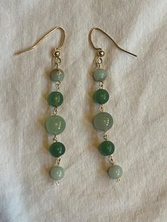 Imperial Jasper, Jade, and Aventurine drop earrings. Handmade with authentic crystal beads. stones said to be good for helping to reduce stress, boost confidence, and strengthen connections with others, soothing fears and feelings of insecurity, fostering inner calm and confidence, and overall health and good luck. Handmade Amazonite Dangle Earrings, Handmade Dangle Amazonite Earrings, Amazonite Natural Stone Earrings For Gifts, Adjustable Aventurine Dangle Jewelry, Aventurine Natural Stone Dangle Jewelry, Aventurine Natural Stone Earrings, Aventurine Natural Stone Earrings Gift, Aventurine Drop Earrings For Gift, Handmade Spiritual Jade Earrings