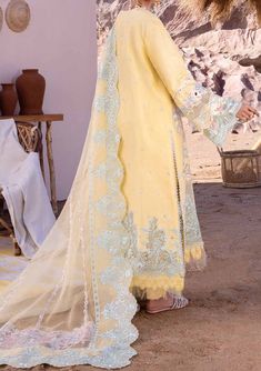 Introducing our New collection 'Luxury Lawn' by Akbar Aslam designed to make you look and feel your best. These pieces will add a touch of class and elegance to your wardrobe. Embroidered Center Panel. Embroidered Side Panels. Embroidered Back and Sleeve. Organza Embroidered Dupatta. Embroidered Border For Front, Back, and Sleeve. Embroidered Sleeve Border. Organza Embroidered Dupatta Pallu. Solid Dyed Pant. Color: There might be slight color variation due to lighting and flashes while the photo shooting. The color may also vary because of different screen resolutions. Wash Care: Dry Clean Only. Akbar Aslam, Readymade Saree, Lawn Dress, Embroidered Border, Embroidered Dupatta, Organza Dupatta, Clothing Websites, Model Pictures, Beautiful Saree