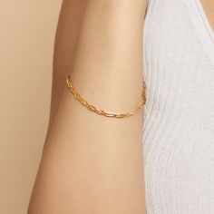 #All Full of vintage allure, our Now & Forever Herringbone Bracelet is a modern take on a true classic. Three petite herringbone chains weave together to form a chic braid of solid gold. The Finer Points: #YellowGold-10kSolidGold-75 Metal: 10k Solid Yellow Gold Dimensions: 3.4mm Wide, 7.5-Inches Long Weight: 2.7 Grams Solid Gold Origin: Crafted in Istanbul, Turkey #TricolorGold-10kSolidGold-75 Metal: 10k Solid Tricolor Gold Dimensions: 3.4mm Wide, 7.5-Inches Long Weight: 2.7 Grams Solid Gold Ori Elegant Curb Chain Bangle, Adjustable Curb Chain Jewelry For Formal Occasions, Formal Adjustable Curb Chain Jewelry, Gold Plated Elegant Snake Chain Bracelet, Elegant 14k Gold Curb Chain Bracelets, Elegant Gold Plated Snake Chain Bracelet, Elegant Gold-plated Snake Chain Bracelet, Elegant Curb Chain Bracelet With Rectangular Links, Elegant Adjustable Gold Bracelet With Curb Chain