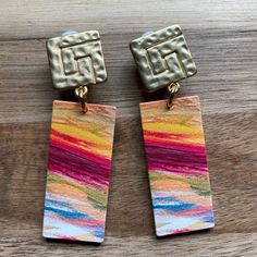 Trendy dangling clip on earrings. Dangling  plastic rectangles with a modern print and clip closures. Three styles available. Comfortable and lightweight.  Earrings are not intended to be worn while sleeping bathing or swimming. Not recommended for children. See more: https://www.etsy.com/ca/shop/CleverLittleEars CANADIAN PRICES INCLUDE GST/HST WHERE APPLICABLE. ETSY WILL CALCULATE ANY PST OWING AT CHECKOUT. While the cost of shipping makes returns or exchanges impractical, please do contact me Artsy Multicolor Rectangular Earrings, Multicolor Rectangular Jewelry For Summer, Earrings Dangling, Abstract Earrings, Modern Print, White Daisy, Lightweight Earrings, Modern Prints, Jewelry Designs