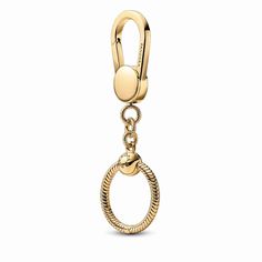 Add sparkle to your tote, cross-body or rucksack with the Pandora Moments Small Bag Charm Holder. Hand-finished with 14k gold plating, this popular charm holder features a small Pandora O Pendant. The flat disc of the lobster clasp can be engraved with your personal mantra. Style up to three of your favorite charms, dangles and pendants and make your bag a part of your story. Pandora O Pendant, Silver Pandora Charms, Pandora Essence, Pandora Bag, Personal Mantra, Pandora Armband, Charms Pandora, Bracelet Tennis, Bracelet Pandora