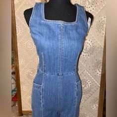 This Jumper Gives Me Vintage Vibes From The 70s But It's Actually Brand New With Tags From Gap! It Has A Cinched Waste That Is Sure To Accentuate All The Right Places. The Flare Pants With Make Your Waste Look Even Smaller! Fitted Medium Wash Cotton Overalls, Retro Fitted Denim Jumpsuit Overall, Retro Fitted Overall Bottoms, Retro Fitted Overalls, Gap Fitted Light Wash Bottoms, Fitted Light Wash Gap Bottoms, Fitted Blue Denim Retro Jumpsuit, Blue Fitted Vintage Denim Jumpsuit, Retro Fitted Medium Wash Jumpsuits And Rompers