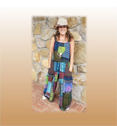 "For the real free-spirited! Roll with these groovy wide leg overalls made with uniqueness and love! No two are the same with all the different patchwork colors ! Adjustable straps. Pockets on sides. Small pocket on front bib. Elastic waist in back. Fair traded. Handmade. Let me know if there is a color you do NOT want....blues/teals, orange/yellows, greens or purples. One Size measurements... Fits approximately sizes 8 -18 Waist stretches up to 39\" Length from waist =38\" Inseam 27\" Up to 50\ Multicolor Wide Leg Jumpsuits And Rompers For Summer, Multicolor Wide Leg Jumpsuits And Rompers For Beach, Bohemian Patchwork Overalls For Spring, Casual Multicolor Wide Leg Jumpsuits And Rompers, Casual Multicolor Wide-leg Jumpsuits And Rompers, Wide Leg Multicolor Jumpsuits And Rompers For Summer, Bohemian Overalls With Pockets For Festivals, Multicolor Wide-leg Jumpsuits For The Beach, Bohemian Jumpsuits And Rompers With Pockets For Festival