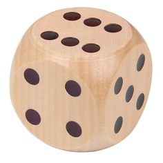 a wooden dice with black dots on it