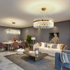 a living room filled with furniture and a chandelier hanging over it's head