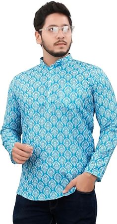 "WELCOME TO MY SHOP STYLEASHRA Give yourself a best ethnic look by wearing this Top / kurta pajama  Made of rich cotton blend fabric this regular-fit set comprises a full-sleeved Indian Long kurta/ kurta This outfit with mojris will look apart on special occasions. material l :100%Cotton Color : blue color  Length : 29 inch Shirt Chest is measurement for shirt (not body) As per standard, for best loose fitting 5\" inches gap should be there between actual chest size and shirt chest size Size chart is below Men's Sizes Actual Body Chest - Ready Shirt Chest i Add 5\" Inches Lose Fitting Fabric Armhole To Armhole. XS - 31\" Inches 36\" Inches S - 35\" Inches 40\" Inches M - 37\" Inche 42\" Inches L - 39\" Inches 44\" Inches XL - 43\" Inches 48\" Inches 2XL - 47\" Inches 52\" Inches 3XL - 51\" Eid Cotton Printed Tops, Cotton Printed Tops For Eid, Blue Long Sleeve Mulmul Traditional Wear, Blue Long Sleeve Kurta In Mulmul, Blue Long Sleeve Mulmul Kurta, Straight Kurta With Printed Motifs For Transitional Season, Transitional Straight Kurta With Printed Motifs, Transitional Season Straight Kurta With Traditional Patterns, Transitional Straight Mulmul Kurta