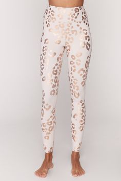 All good things are wild and free. The Lux High Waist Legging from Spiritual Gangster is a must-have! Features a high, double layer waistband to slim and compress and panel gusset designed for better range of motion and comfort. All over cheetah print in rose gold foil. Made from SG Studio Jersey, this legging is sweat wicking and quick drying for all day comfort. Poly/Spandex activewear blend. Model is 5'9" and wearing a size small. Cheetah Print Clothes, Cheetah Print Leggings, Y2k Clothing, Spiritual Gangster, Rose Gold Foil, Athleisure Wear, Leggings Design, Wild And Free, Girly Fashion