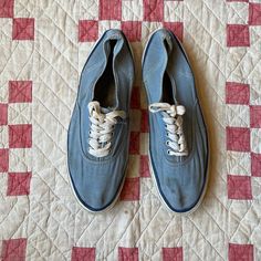 Vintage 1980s Vans-style chambray low top skate shoes by Patriot. Classic style lace-up sneakers with a fabric upper and white rubber sides and tan rubber soles. Lightly cushioned insole with built-in arch support. White flat laces with metal tips. Made in USA. In good vintage condition. Marks and wear to the fabric upper throughout. Marks, wear, and minor cracks throughout the white rubber sides. Marks and wear to the soles. Fabric is distressed at the heels both inside and out. They still have lots of life in them! Please see photos for full condition description. Label: Patriot - Made in USA Approximate size: US M 11-11.5 Interior length: 11 in Interior width across ball of foot: 3.75 in Exterior length: 11.5 in Exterior width across ball of foot: 3.75 in Please DM us with any questions Shoes Low Top, White Flat, Vans Style, Sneakers Athletic, White Flats, Style Classique, Canvas Sneakers, Skate Shoes, Chambray