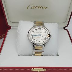 Men's Cartier 42mm Ballon Bleu Two Tone 18K Yellow Gold / Stainless Steel Watch with Roman Numeral Silver Dial and Smooth Bezel. Includes Box and Papers. Ballon Bleu de Cartier watch, 42 mm. Mechanical movement with automatic winding, caliber 1847 MC. Steel case, 18K yellow gold (750/1000) fluted crown set with a cabochon synthetic spinel. Silver guilloché dial. Blued-steel sword-shaped hands. Sapphire crystal. Calendar aperture at 3 o’clock. Two-tone interchangeable bracelet. Thickness: 13 mm. Designer Yellow Gold Watch With Subdials, Cartier Yellow Gold Chronometer Watch Accessories, Yellow Gold Watches With Subdials For Anniversary, Cartier Chronometer Watch Accessories In Yellow Gold, Elegant Automatic Diamond Watch, Anniversary Yellow Gold Watches With Subdials, Designer Yellow Gold Watch With Skeleton Dial, Designer Yellow Gold Watches With Polished Finish, Luxury Gold Cartier Watch