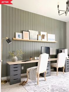 a desk with two chairs and a computer on top of it in front of a wall