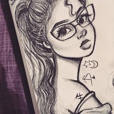 a drawing of a woman with glasses and writing on her face, next to an instagram page