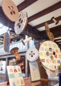 several different types of buttons hanging from the ceiling