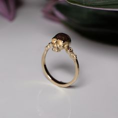 The Number One Hundred and Nineteen  - Gold skull ring   Carved by hand and cast in solid 9ct Yellow gold, this dainty piece of treasure looks wonderful on its own, but even better in a stack.  Although equally as beautiful, as each piece is hand created, no two will be exactly the same. Thus making each piece completely unique, much like the people they are made for. This ring has been made by hand in London. Materials: 100% recycled 9ct Yellow Gold   Measurements: Skull measures approx 7mm wid Yellow Gold Skull Jewelry For Gift, Gift Skull-shaped Hallmarked Rings, Mens Skull Rings, Bespoke Rings, Gold Skull, Biker Rings, Gothic Rings, Skull Ring, Pearl Drop Earrings